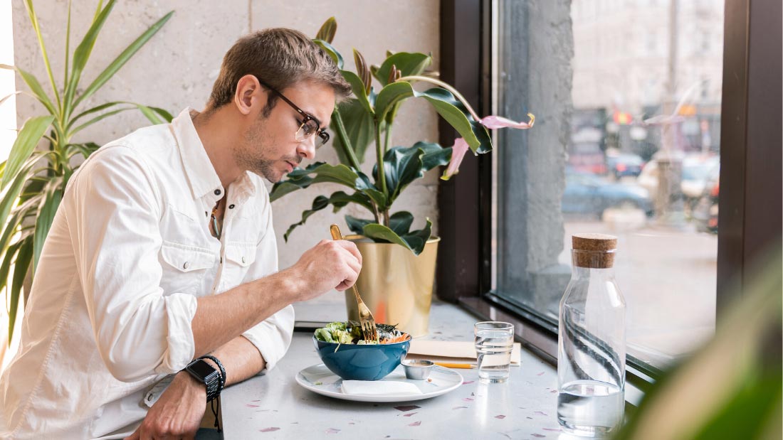 Man having vegan lunch