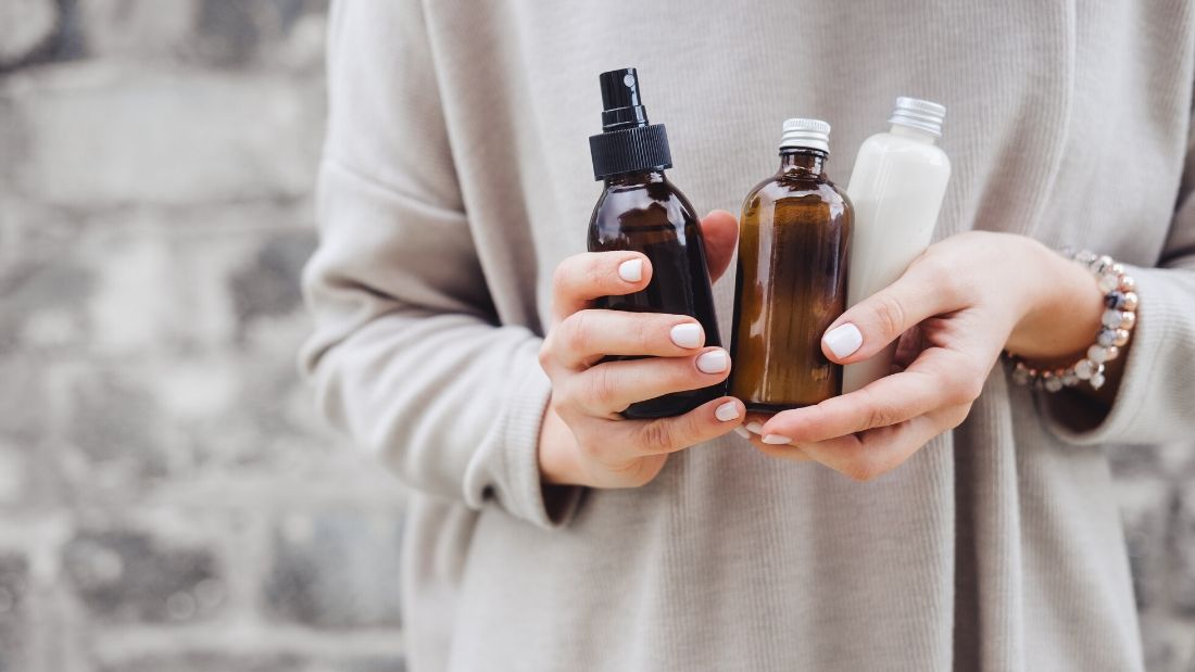 Man holding vegan cosmetics