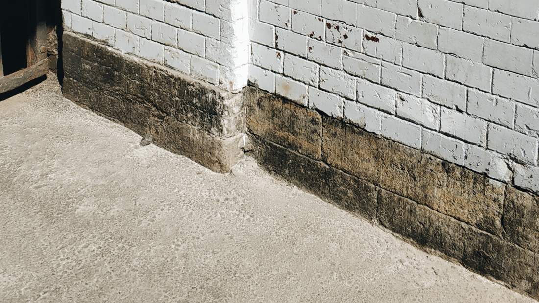 concrete wall and floor used for knocking piglets