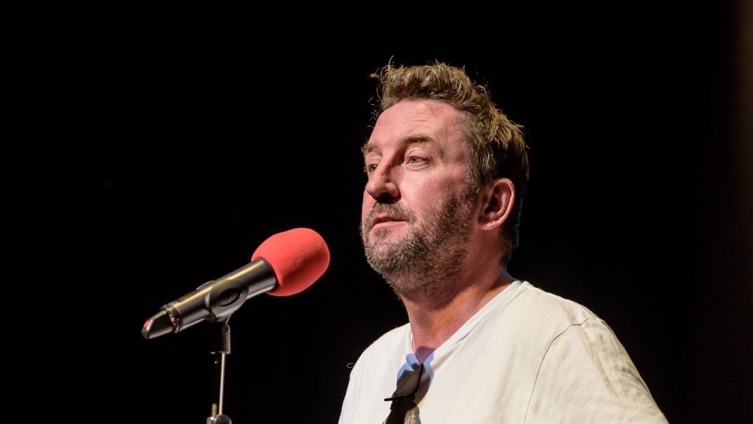 lee mack at a microphone