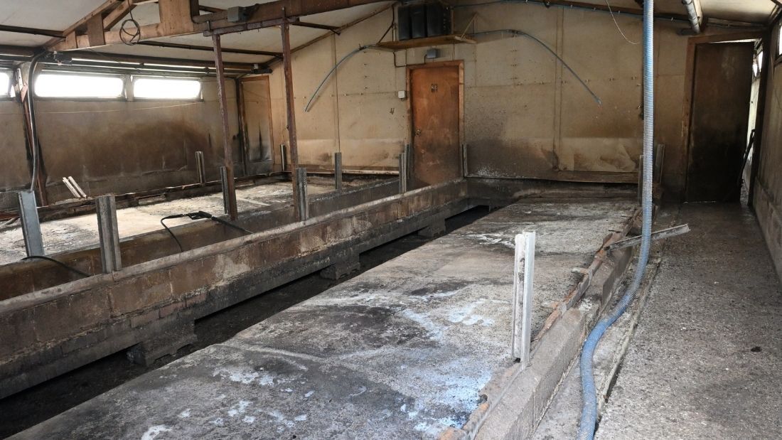 An empty farrowing shed