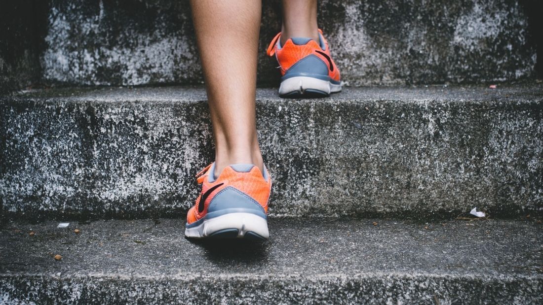 trainers going up stairs