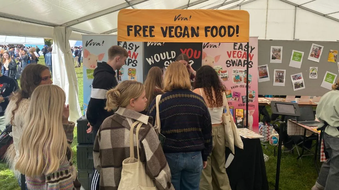 Students queue for free food at Viva!'s freshers event in Bristol