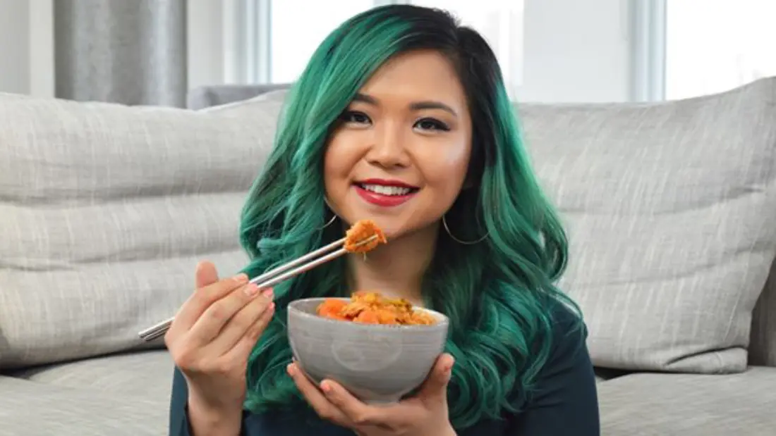 rose lee eating tofu with chopsticks